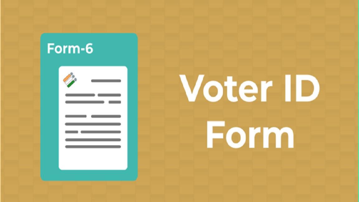 Indian voter ID card and Form 6 application on a desk with a laptop showing the Voter Helpline portal